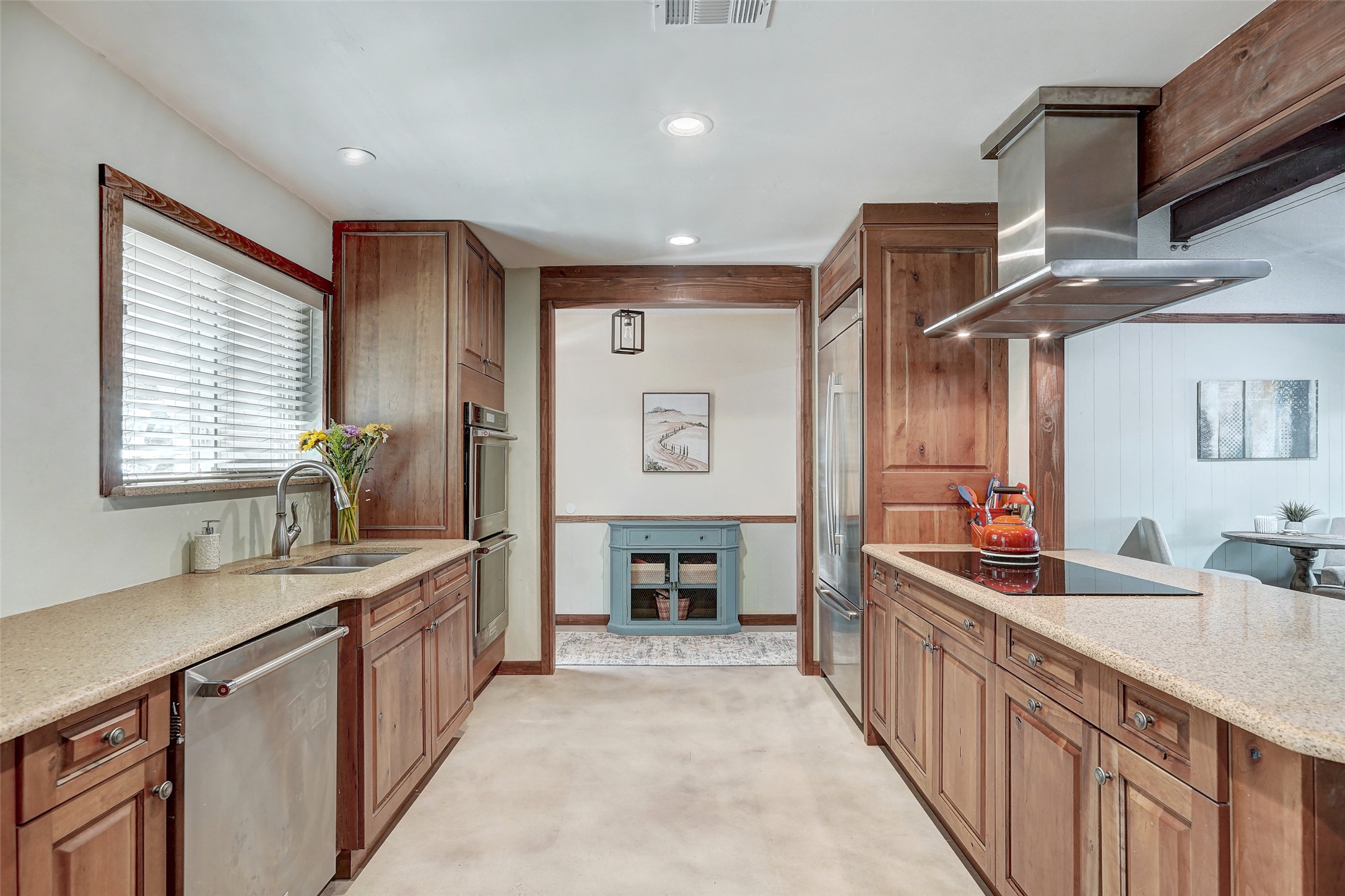 1105 North Riviera Circle Cedar Park, TX 78613 - Photo 10 of 32 a large white kitchen with a large window