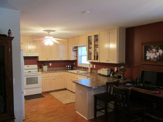 201 Dye Road Gray, GA 31032 - Photo 20 of 20 a large kitchen with a sink and cabinets