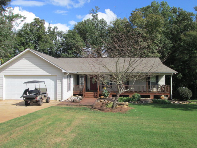 201 Dye Road Gray, GA 31032 - Photo 4 of 20 a view of a house with sitting area and garden