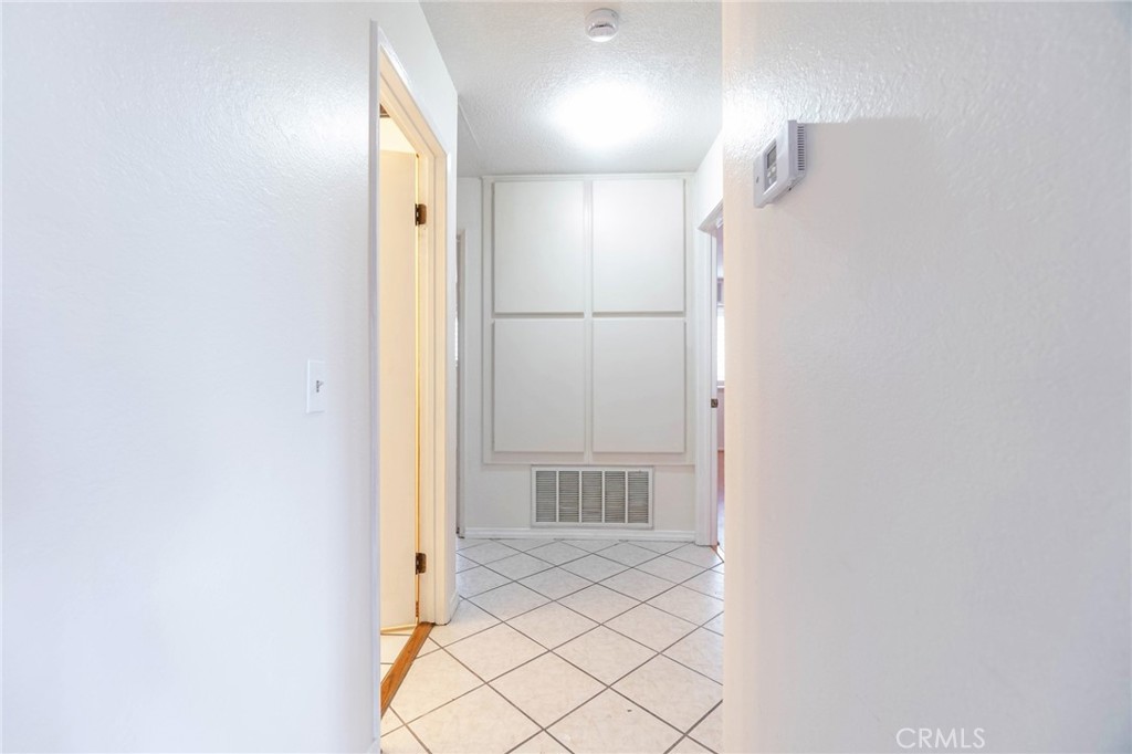 7210 Mesada Street Rancho Cucamonga, CA 91701 - Photo 23 of 32 a view of a hallway