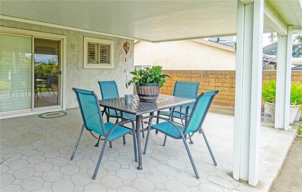 7210 Mesada Street Rancho Cucamonga, CA 91701 - Photo 29 of 32 a view of a dining room with furniture and window