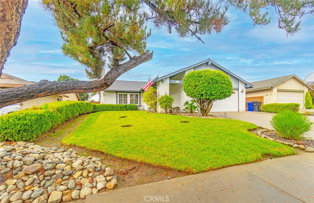 7210 Mesada Street Rancho Cucamonga, CA 91701 - Photo 6 of 32 a view of swimming pool with a garden