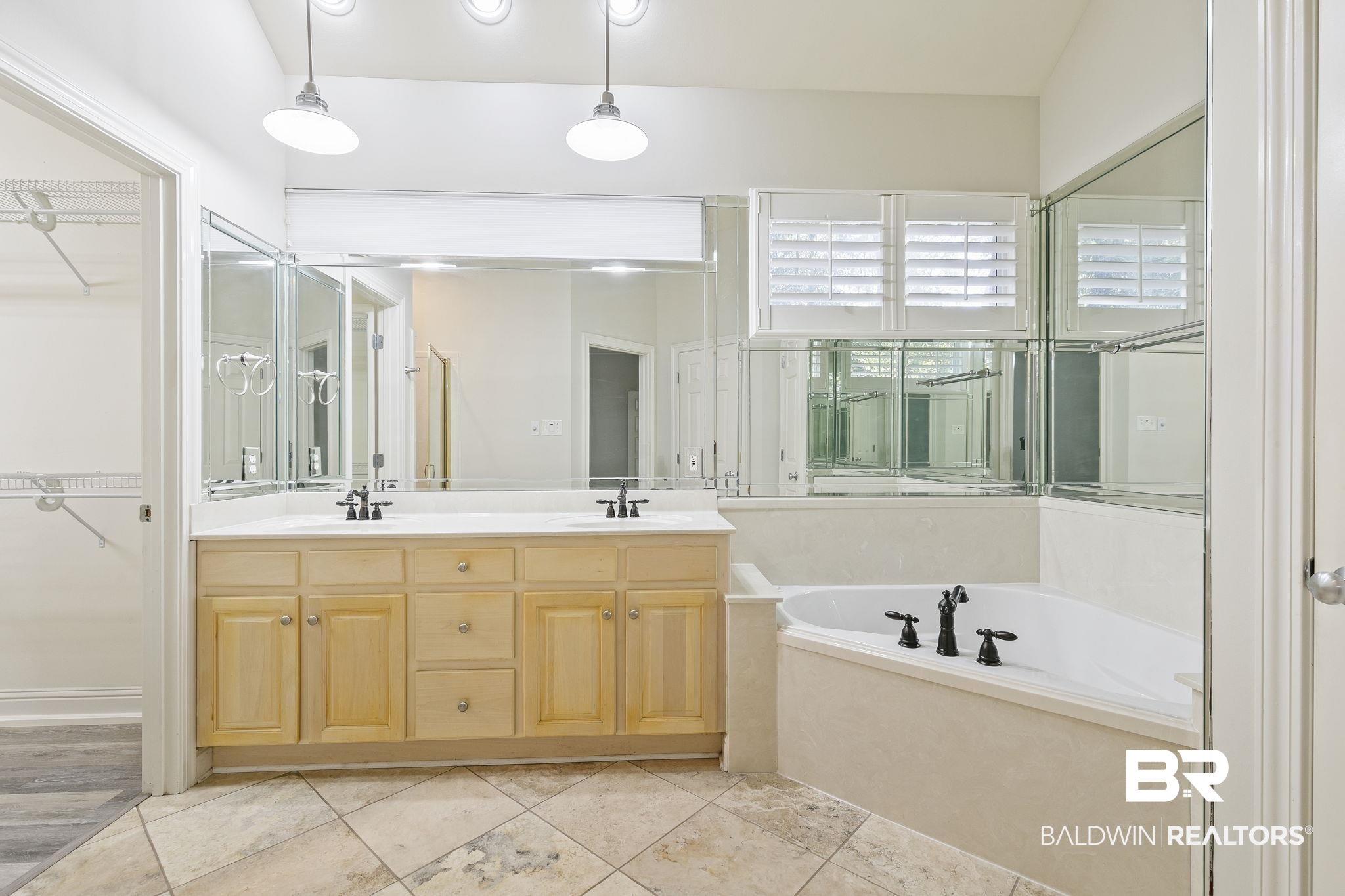 13 Bugle Retreat Daphne, AL 36527 - Photo 10 of 40 Bathroom with vanity, tile patterned floors, and a tub