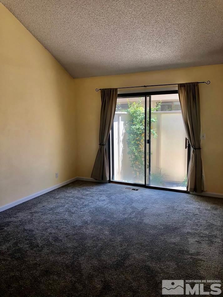 1298 Conway Lane Reno, NV 89503 - Photo 15 of 27 an empty room with large windows