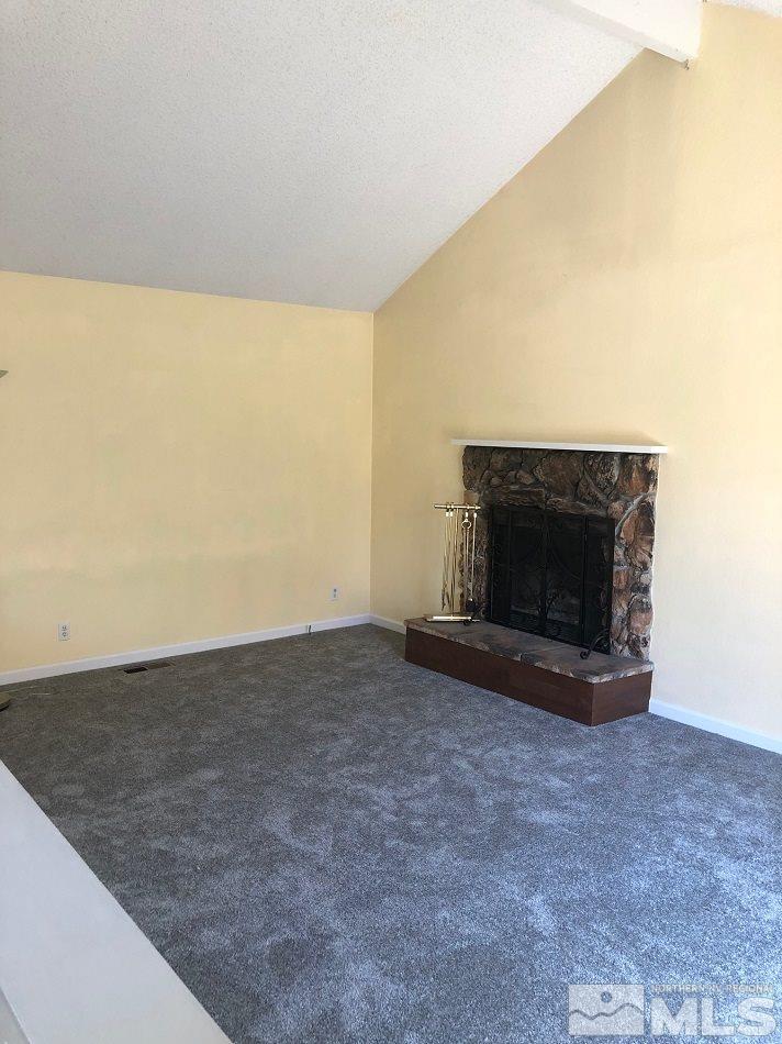 1298 Conway Lane Reno, NV 89503 - Photo 17 of 27 a view of empty room with a fireplace