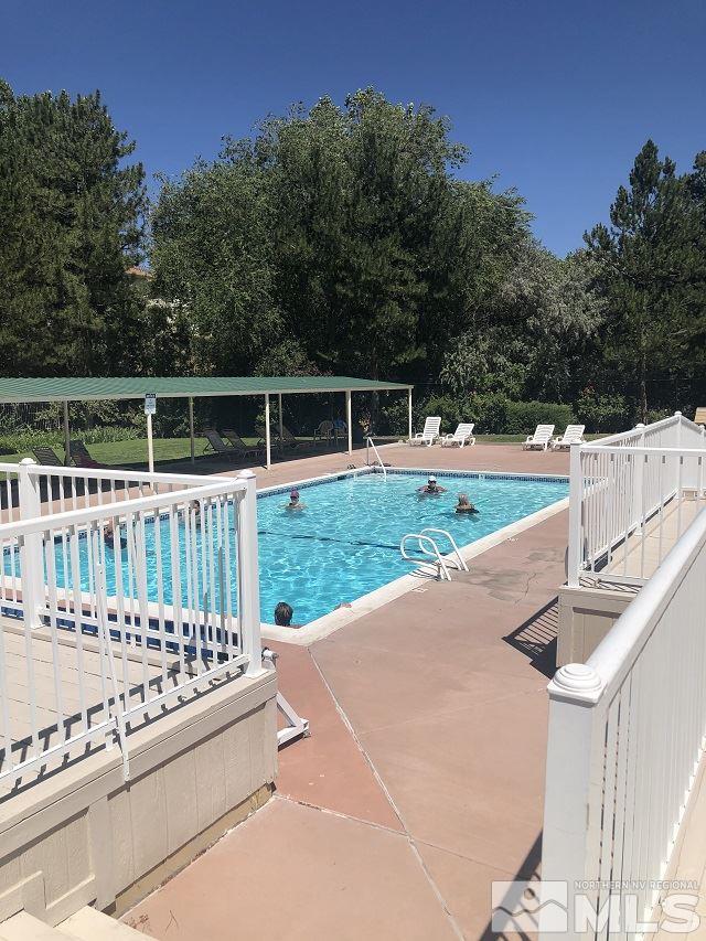 1298 Conway Lane Reno, NV 89503 - Photo 23 of 27 a view of a deck with a yard