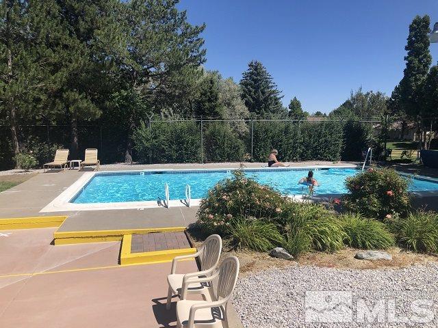 1298 Conway Lane Reno, NV 89503 - Photo 24 of 27 a view of swimming pool with seating space