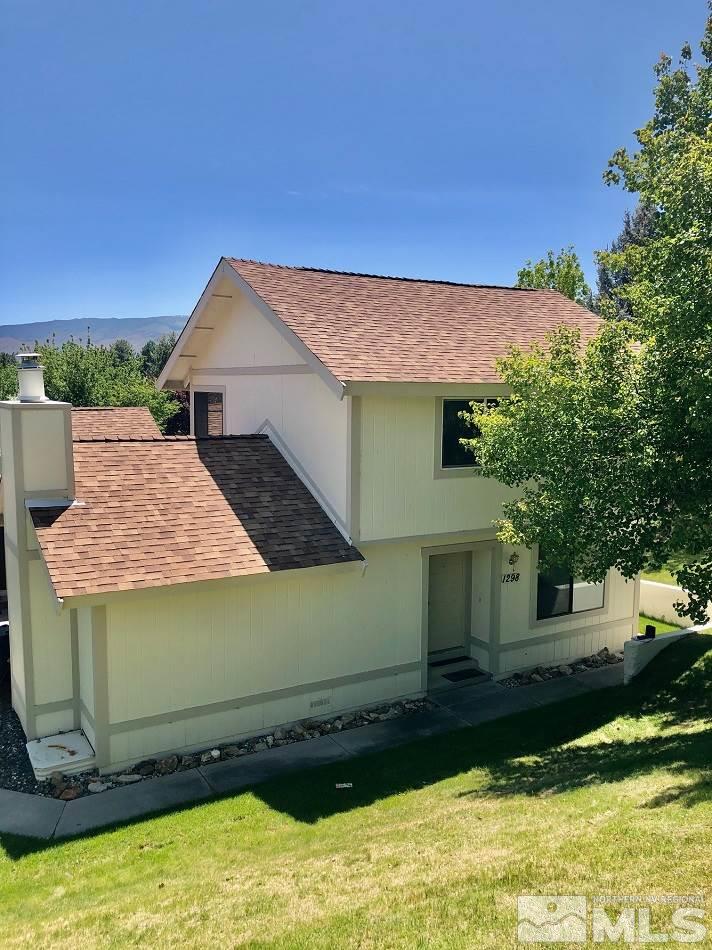 1298 Conway Lane Reno, NV 89503 - Photo 3 of 27 a view of a house with a yard