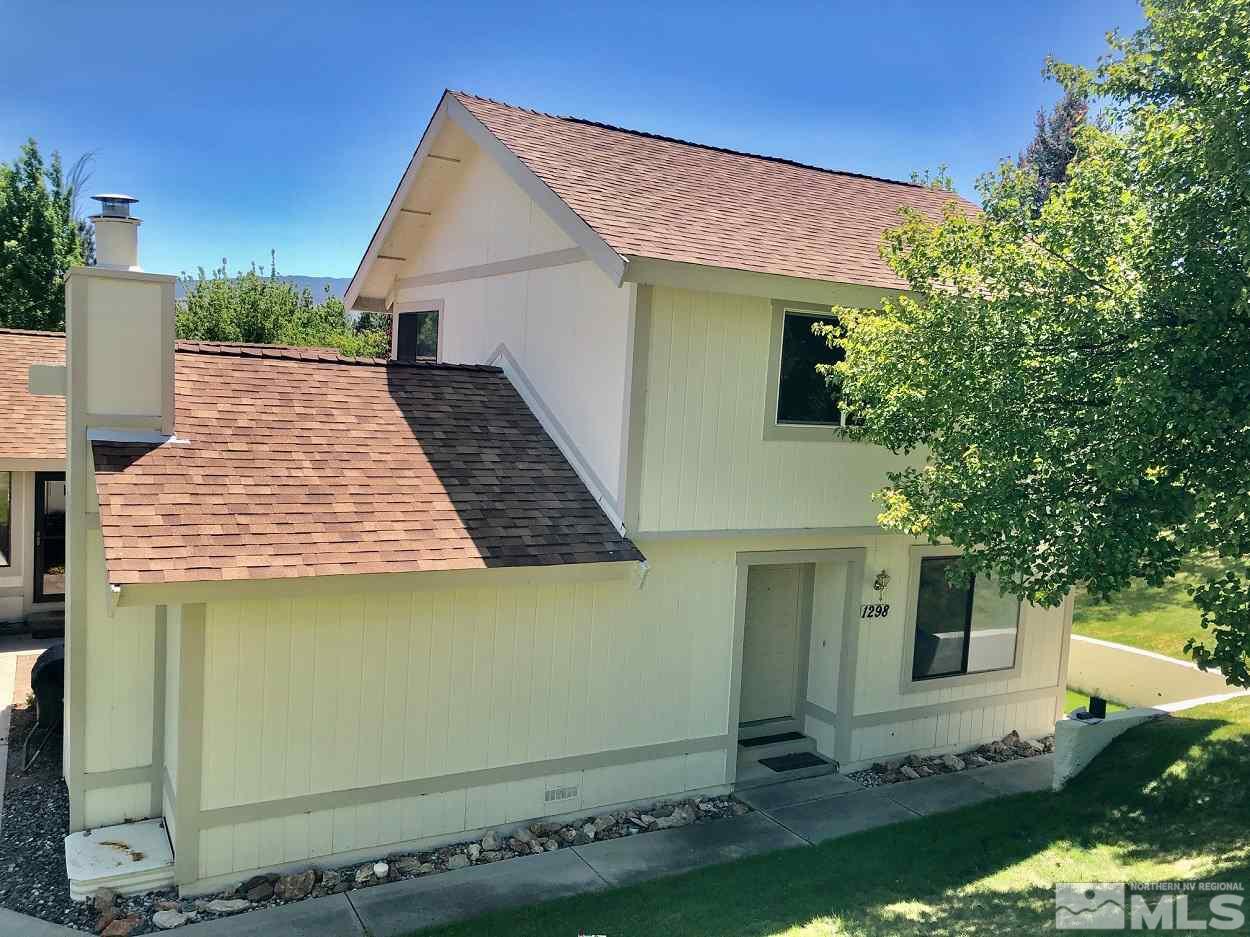 1298 Conway Lane Reno, NV 89503 - Photo 4 of 27 a view of a house with a yard