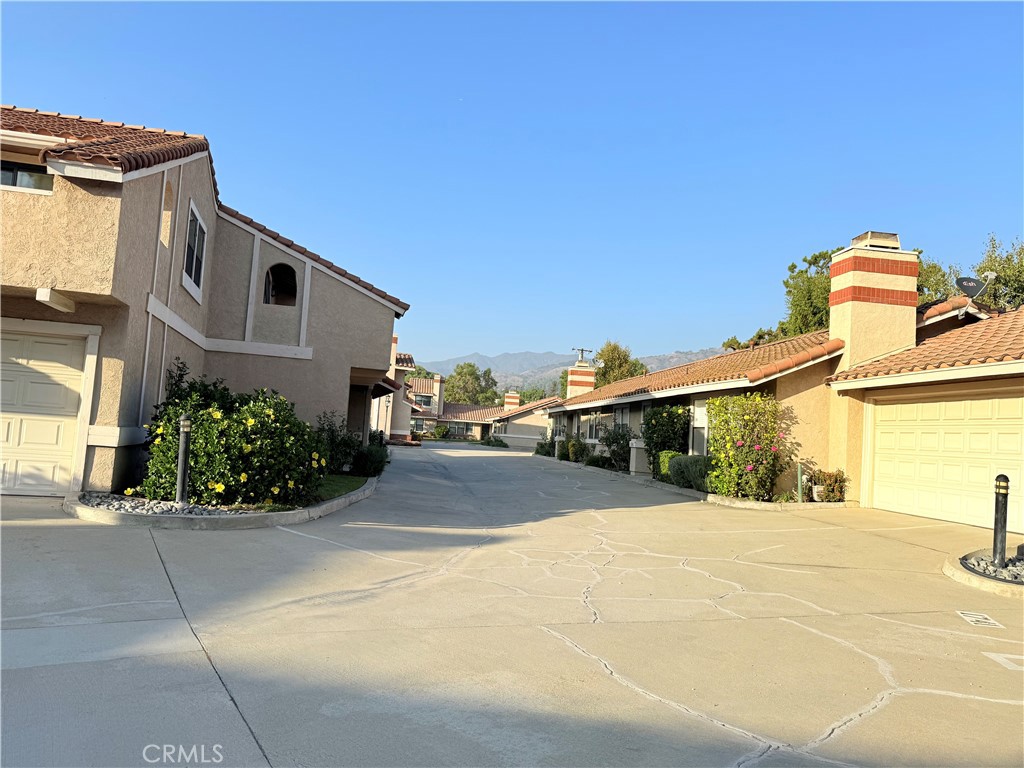 1749 Compromise Line Road Glendora, CA 91740 - Photo 2 of 16 a front view of a house with a garden