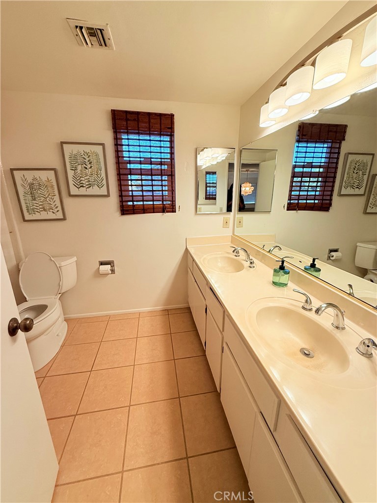 1749 Compromise Line Road Glendora, CA 91740 - Photo 6 of 16 a spacious bathroom with a double vanity sink a mirror and a shower