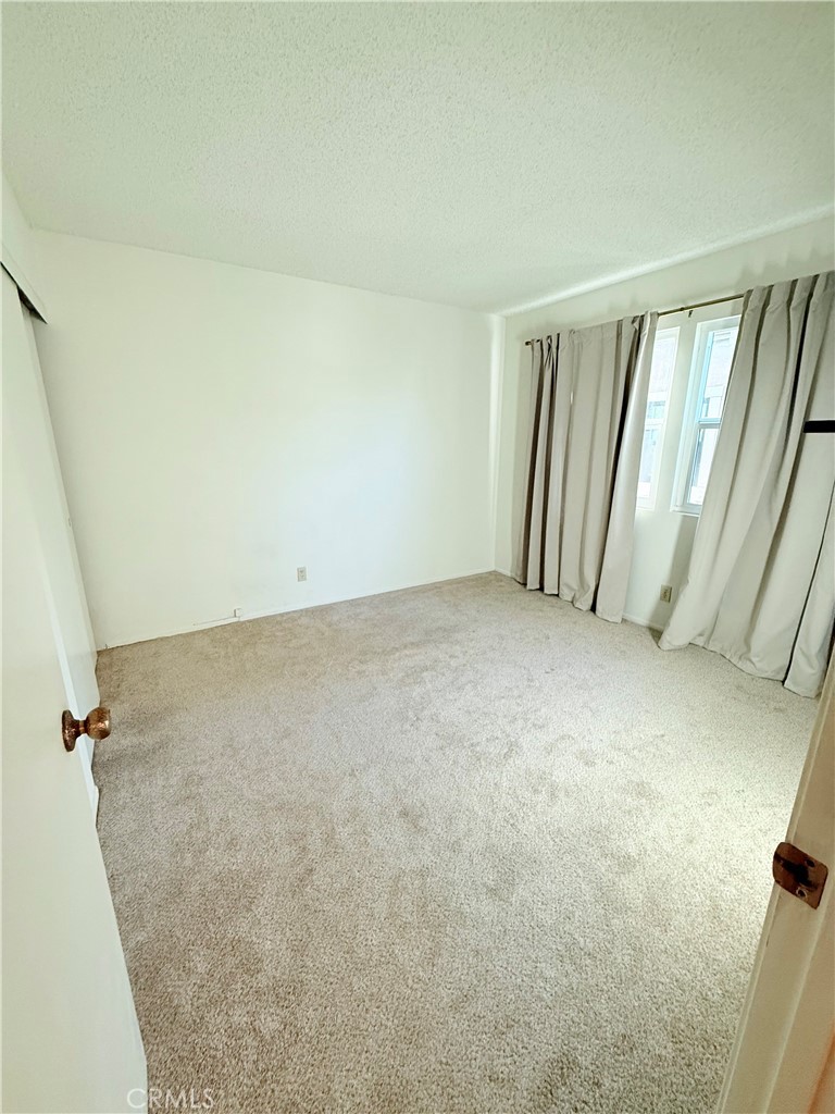 1749 Compromise Line Road Glendora, CA 91740 - Photo 9 of 16 an empty room with windows