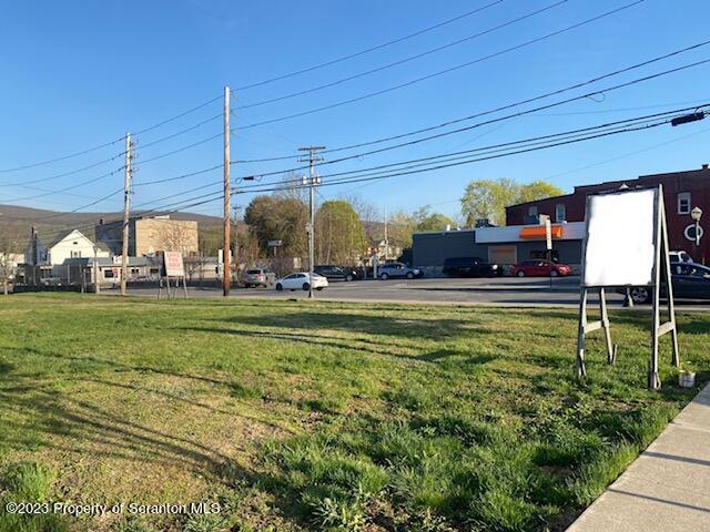 48 South Main Street Carbondale, PA 18407 - Photo 6 of 13 a view of a swimming pool with a yard