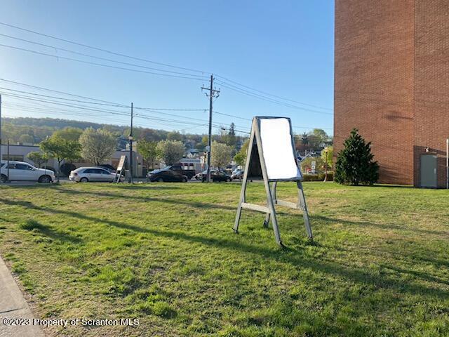 48 South Main Street Carbondale, PA 18407 - Photo 8 of 13 a view of a chair and fire pit in the yard