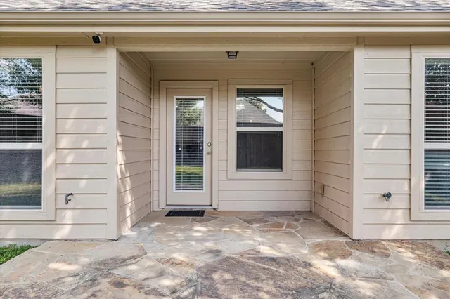 a view of front door and porch