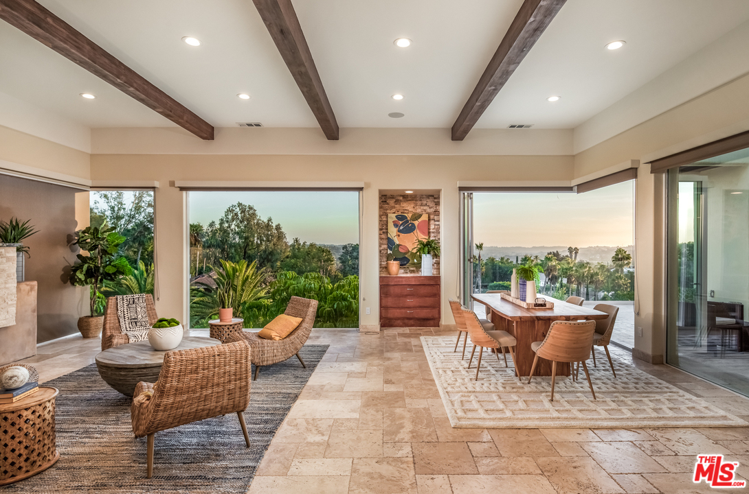 1264 Rancho Encinitas Drive Encinitas, CA 92024 - Photo 7 of 25 a living room with furniture and a large window