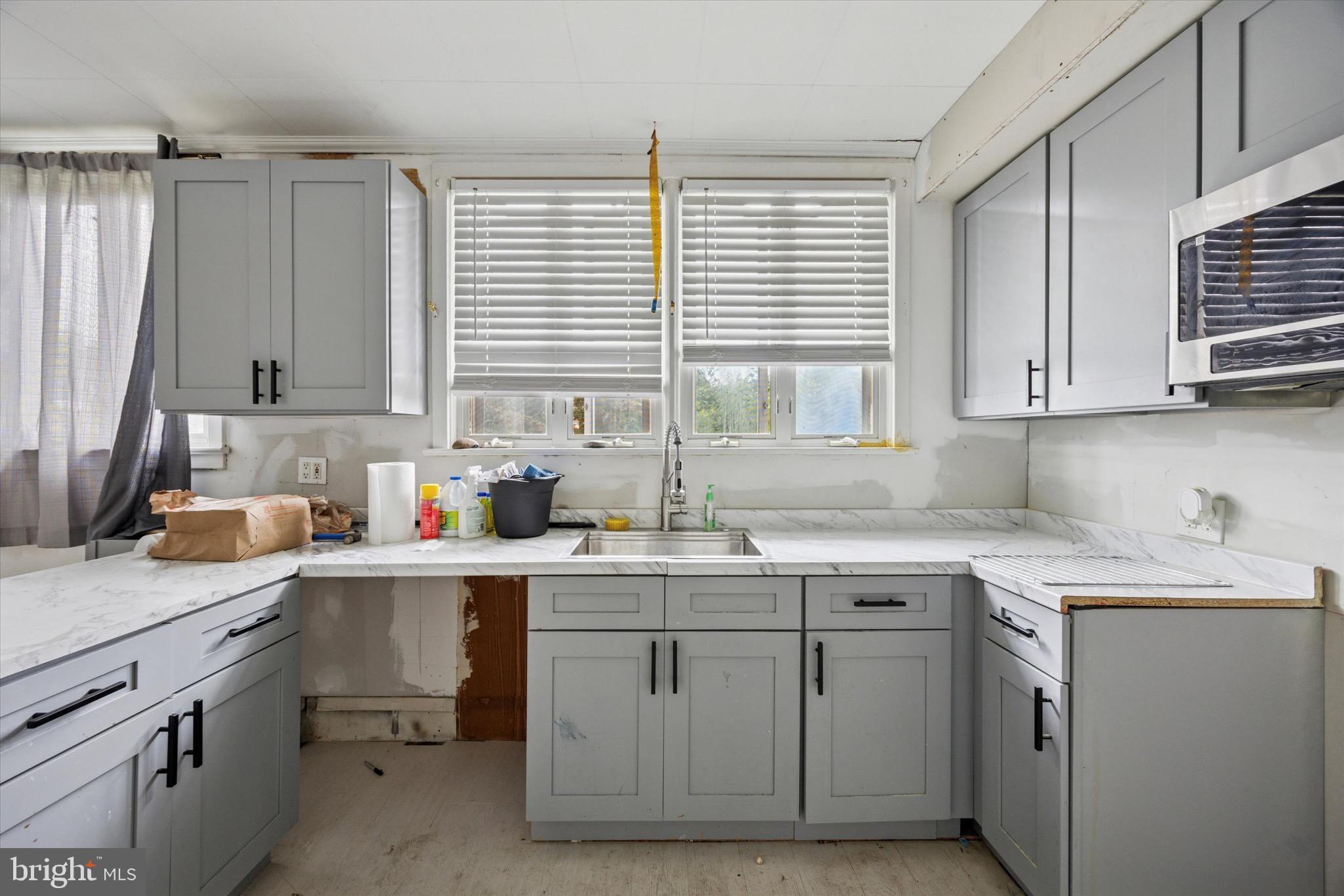1000 Main Avenue Croydon, PA 19021 - Photo 12 of 25 a kitchen with a sink cabinets and window