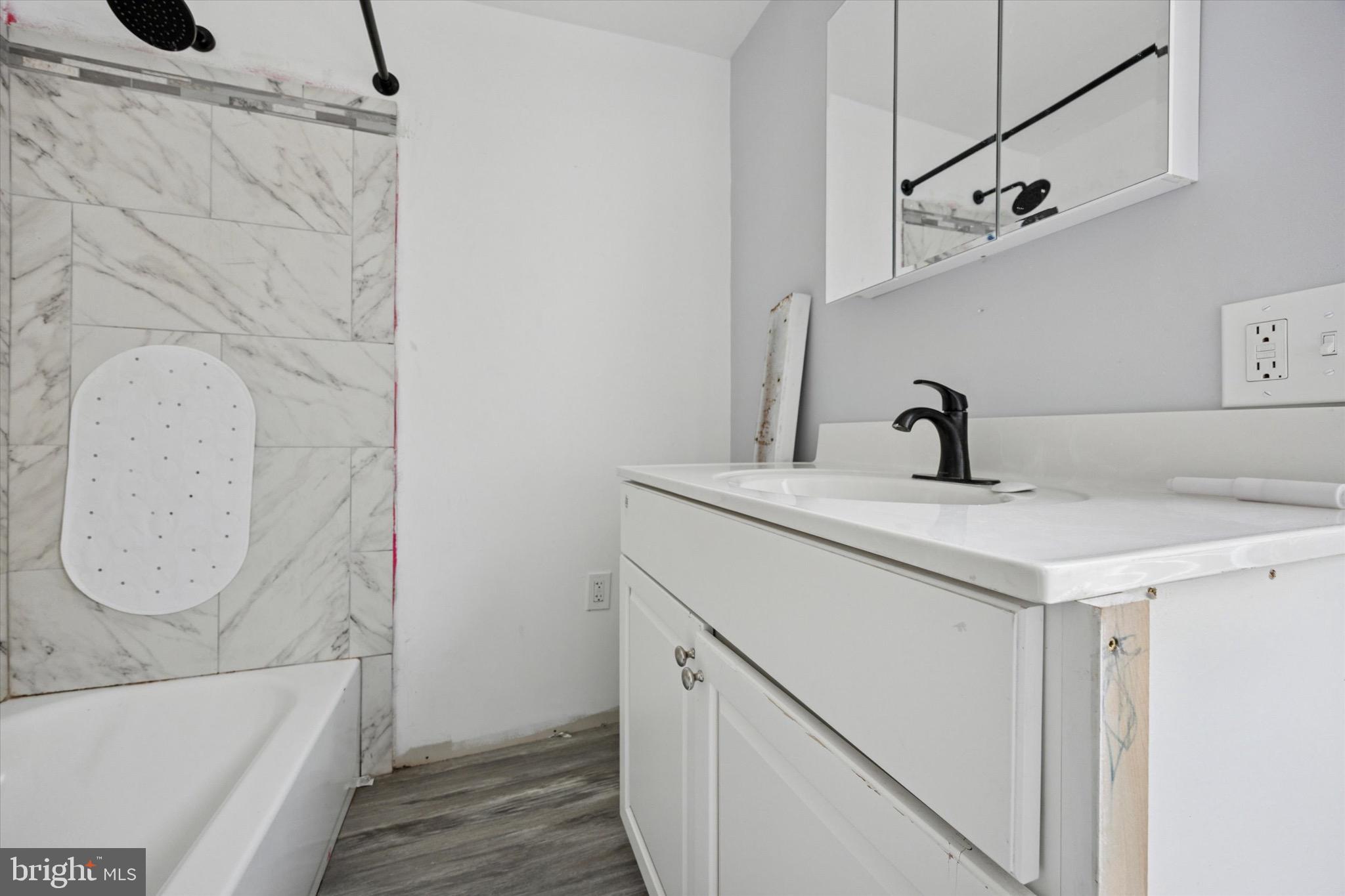 1000 Main Avenue Croydon, PA 19021 - Photo 14 of 25 a bathroom with a sink and a mirror