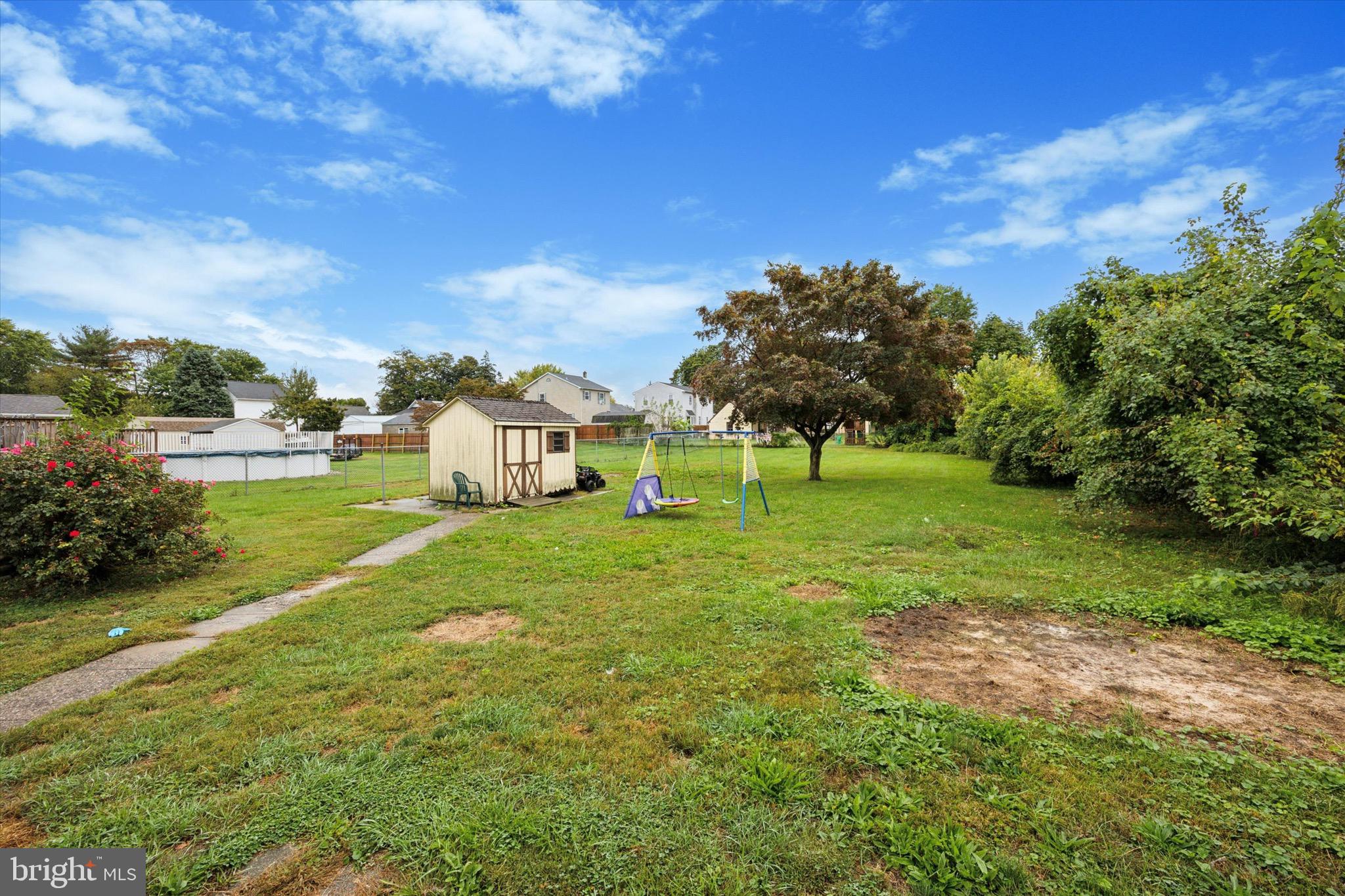 1000 Main Avenue Croydon, PA 19021 - Photo 23 of 25 a view of a big house with a big yard and large trees