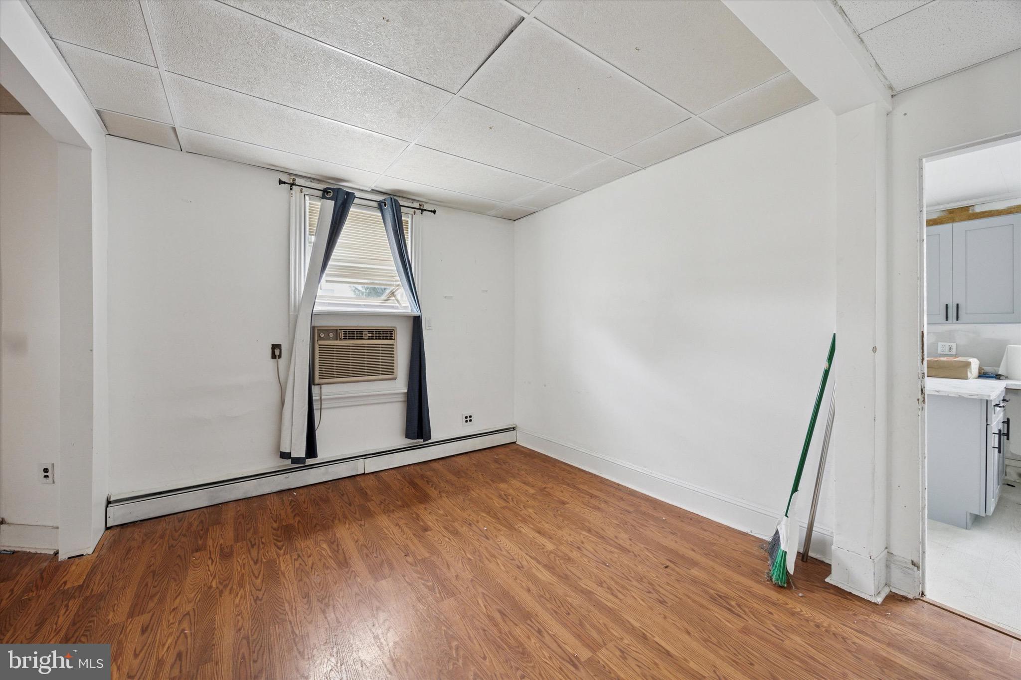 1000 Main Avenue Croydon, PA 19021 - Photo 6 of 25 a view of an empty room with wooden floor and a window