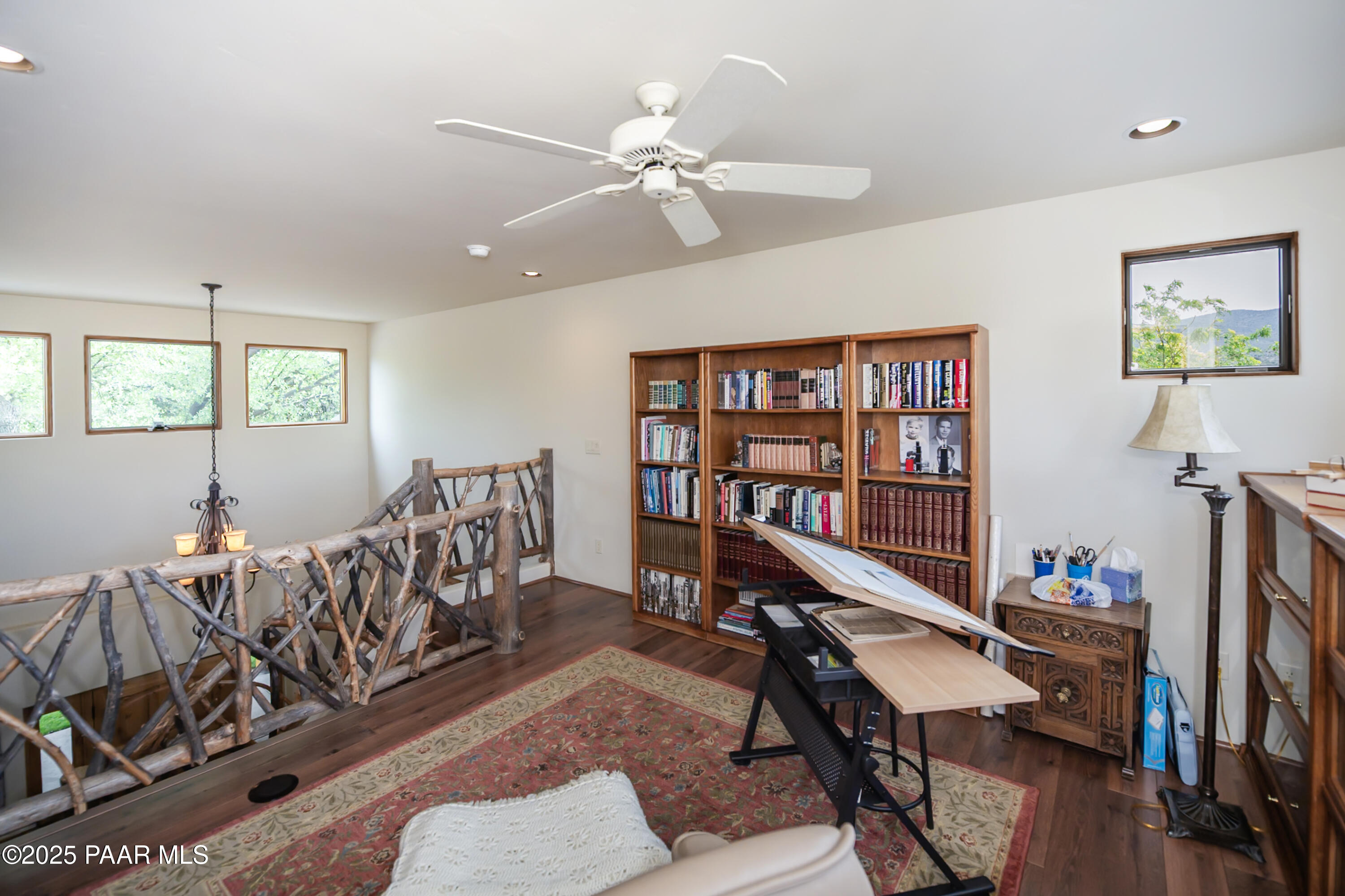 770 Grisby Road Skull Valley, AZ 86338 - Photo 29 of 58 a workspace with furniture window and wooden floor