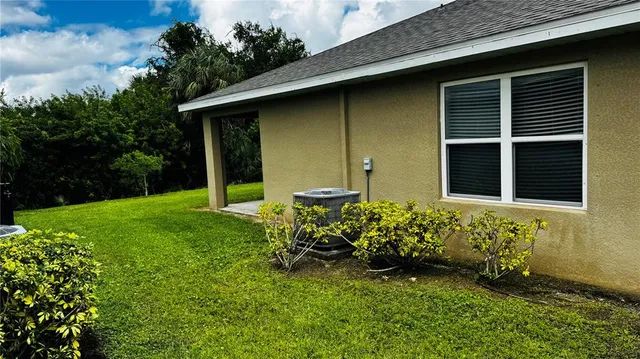 a house with garden in front of it