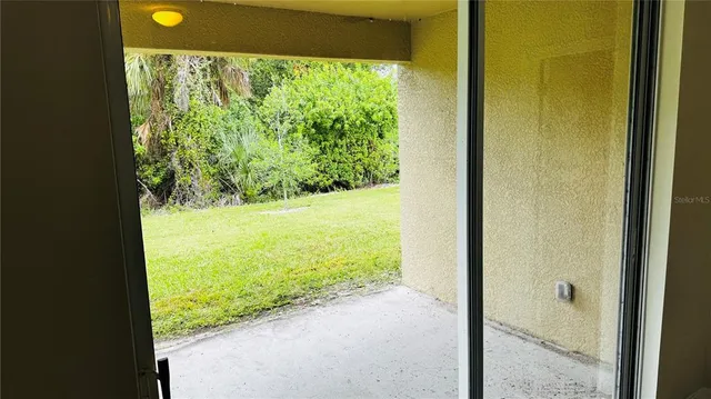 a view of a yard from a window