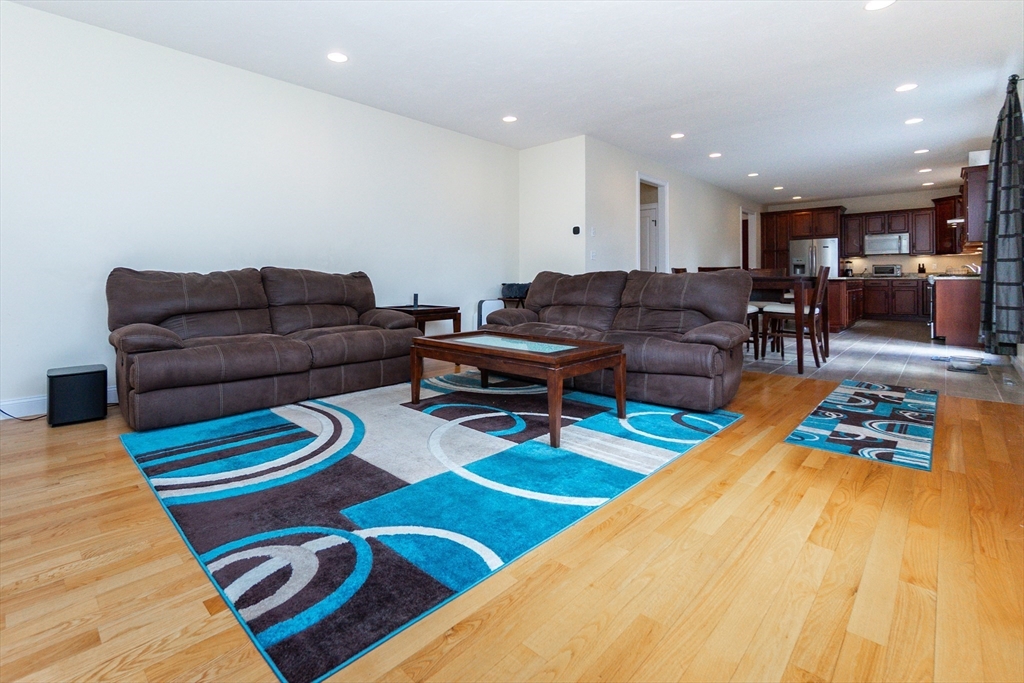 31 Whitehall Way Bellingham, MA 02019 - Photo 12 of 39 a living room with furniture and wooden floor
