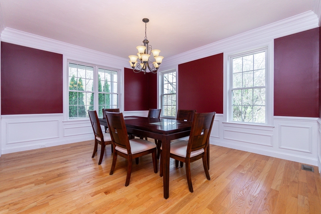 31 Whitehall Way Bellingham, MA 02019 - Photo 14 of 39 a view of a dining room with furniture window and wooden floor
