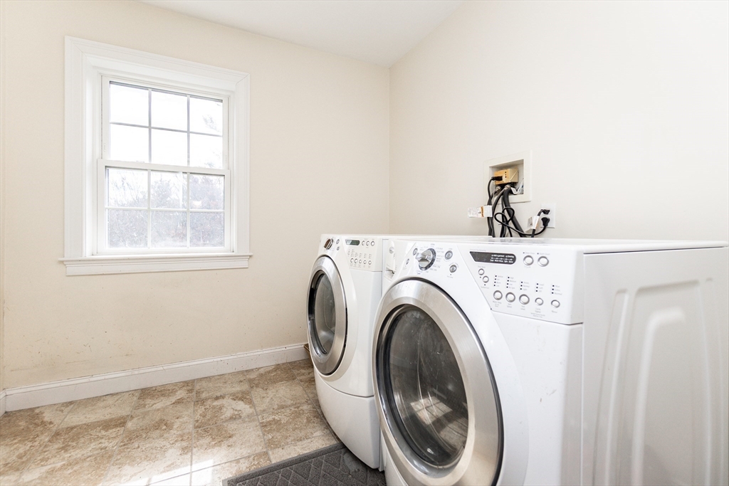 31 Whitehall Way Bellingham, MA 02019 - Photo 24 of 39 a utility room with dryer and washer