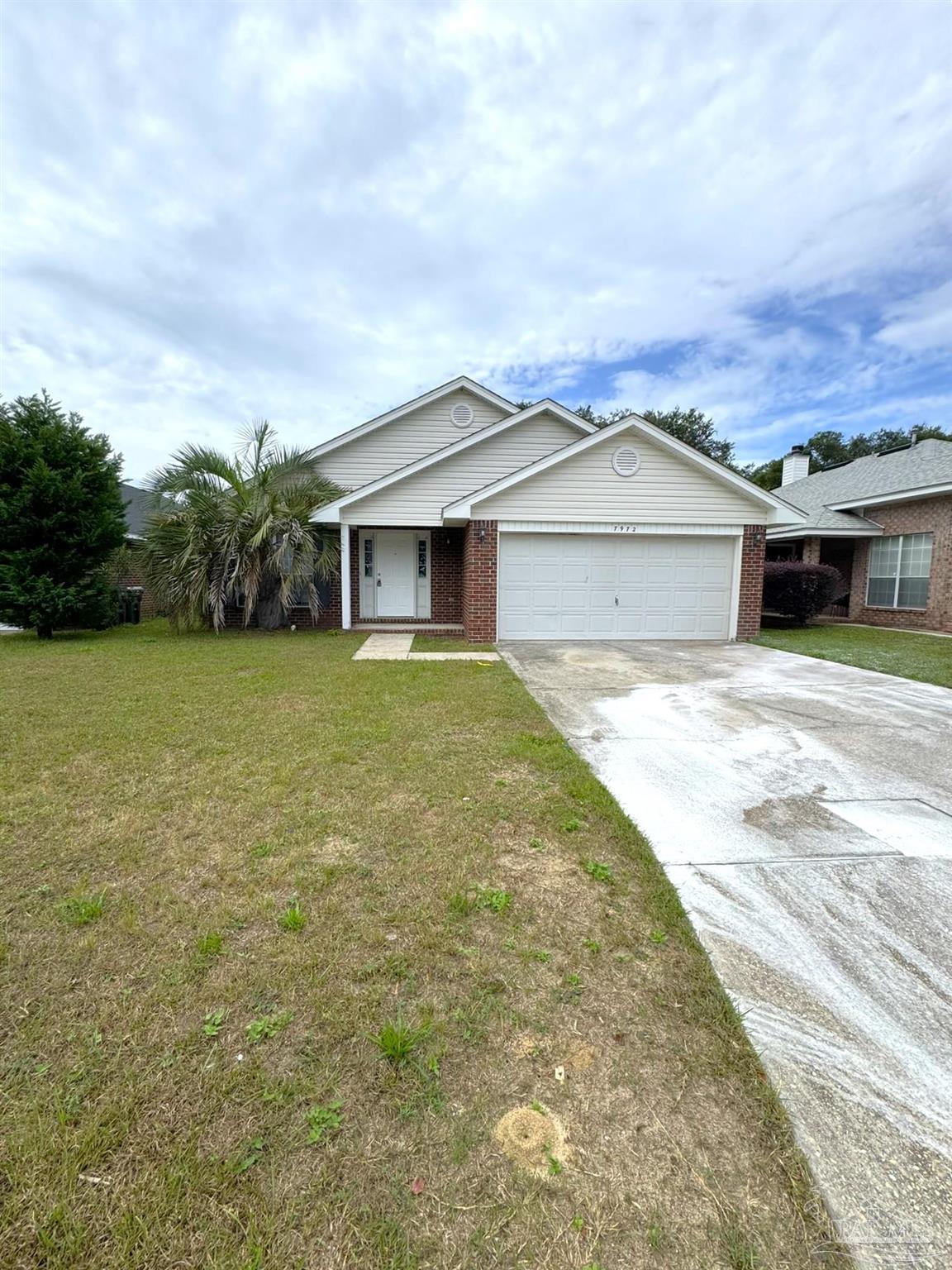 7972 Cayenne Way Pensacola, FL 32526 - Photo 1 of 11 a view of a house with a yard