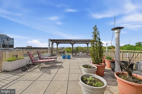 a view of a terrace with furniture