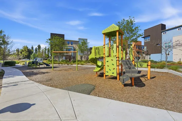 a view of a park with swings