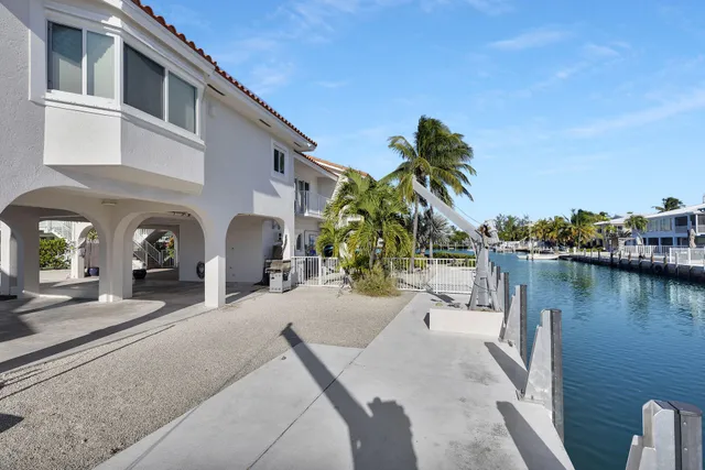 a living room with furniture and windows