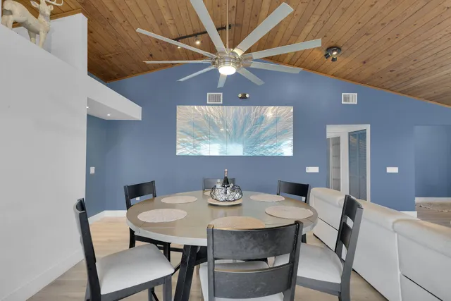 a kitchen with a sink stove and refrigerator