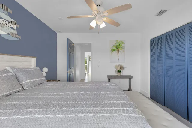 a view of a wooden house with a yard