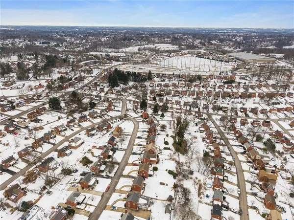 an aerial view of multiple house