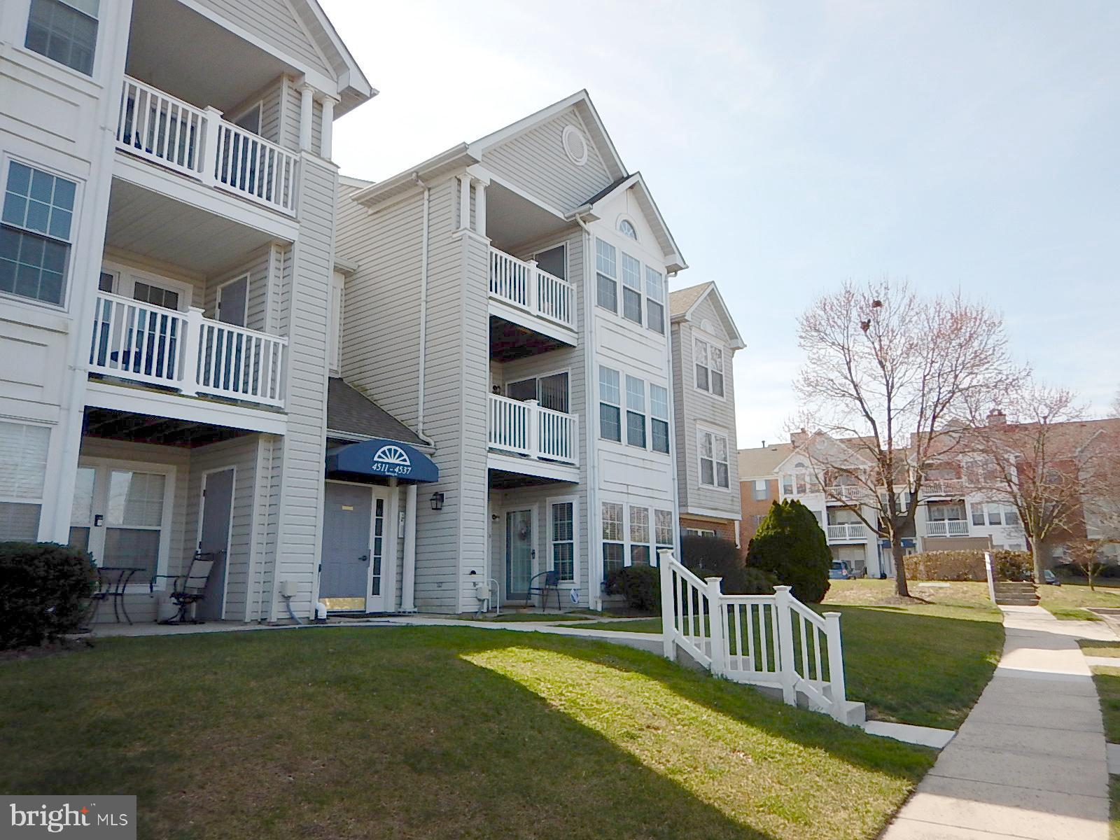 4513 Aspen Mill Road, Unit 4513 Nottingham, MD 21236 - Photo 1 of 25 Front of building and stairs to secure front door