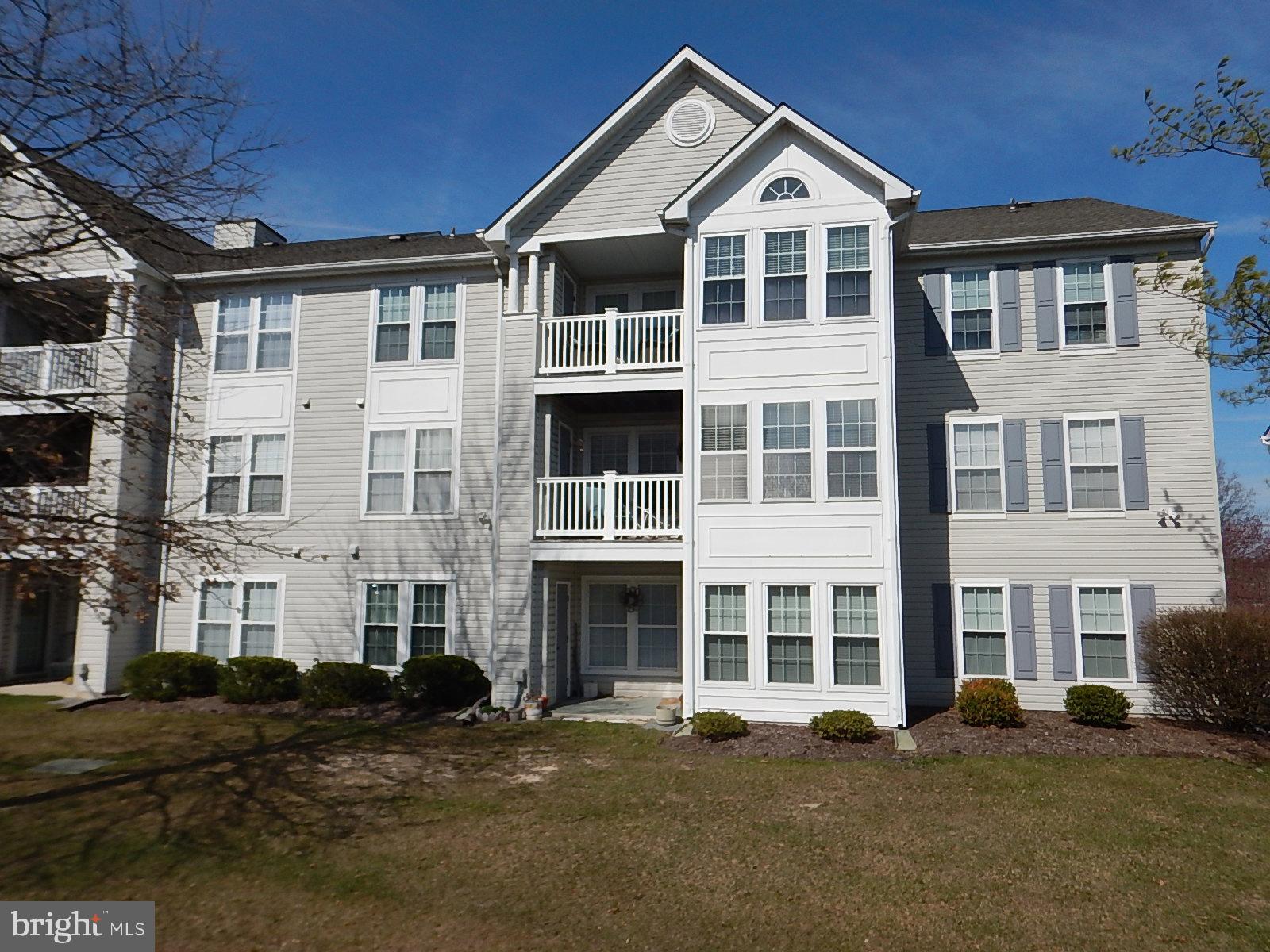 4513 Aspen Mill Road, Unit 4513 Nottingham, MD 21236 - Photo 15 of 25 1st floor rear condo and patio