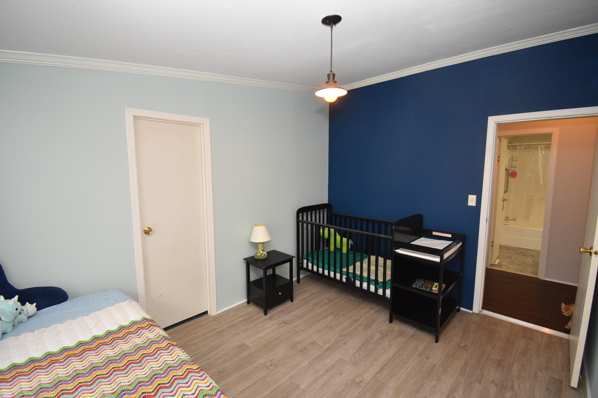 8484 Creek Road Willow Spring, NC 27592 - Photo 17 of 33 a bedroom with furniture and a window