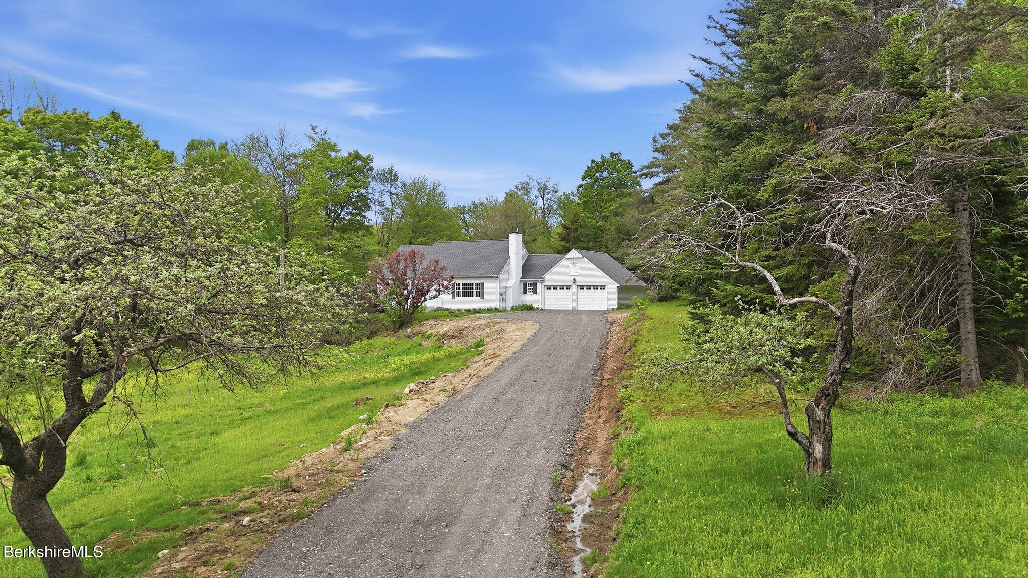 98 N Road Monroe, MA 01247 - Photo 1 of 32 a view of a pathway with a yard