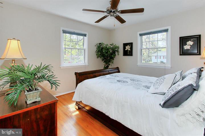 7012 Hadlow Drive Springfield, VA 22152 - Photo 15 of 21 a bedroom with a large bed and a window