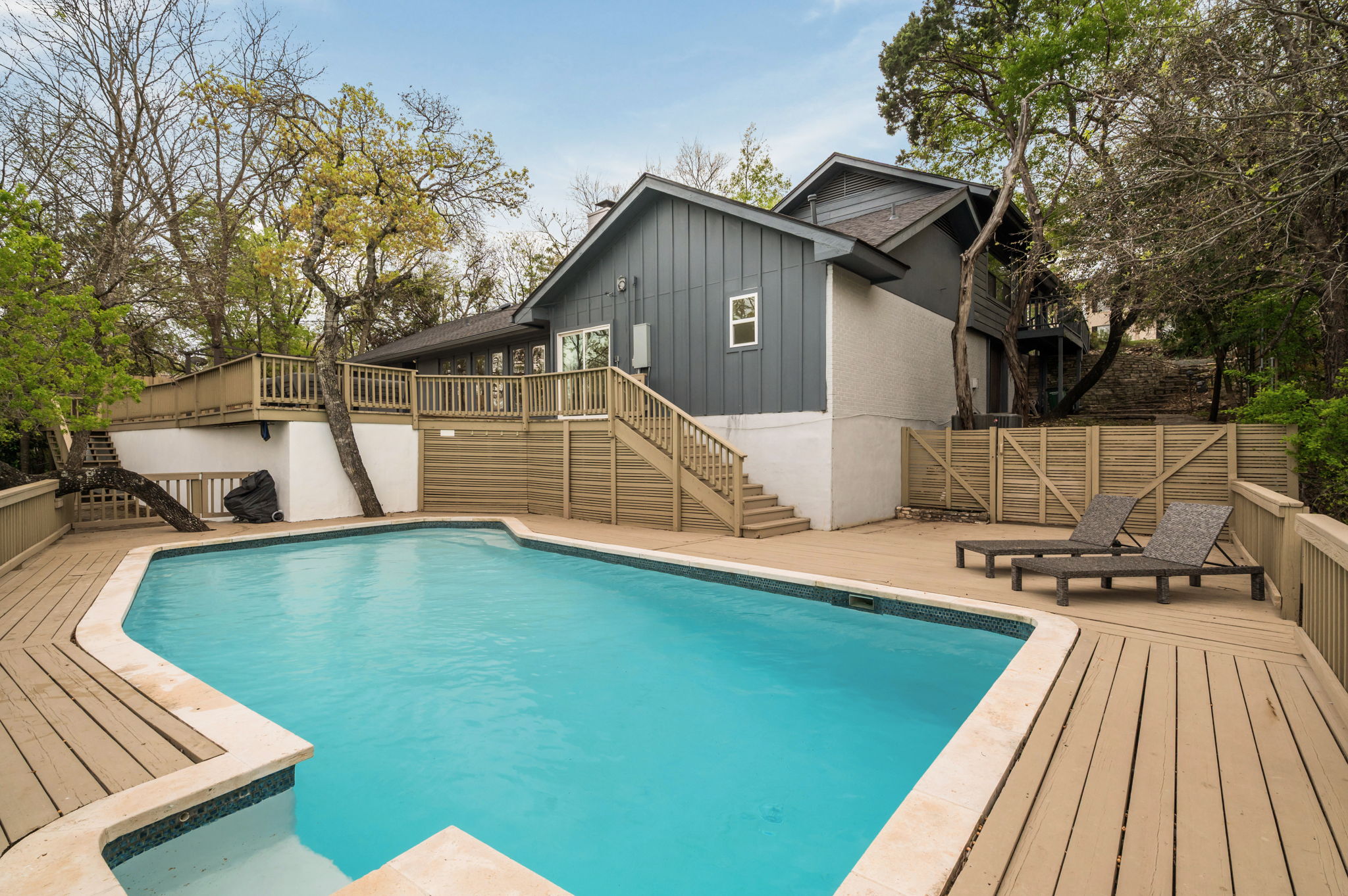 6501 Sumac Drive Austin, TX 78731 - Photo 29 of 40 Swimming pool featuring a wooden deck and a patio