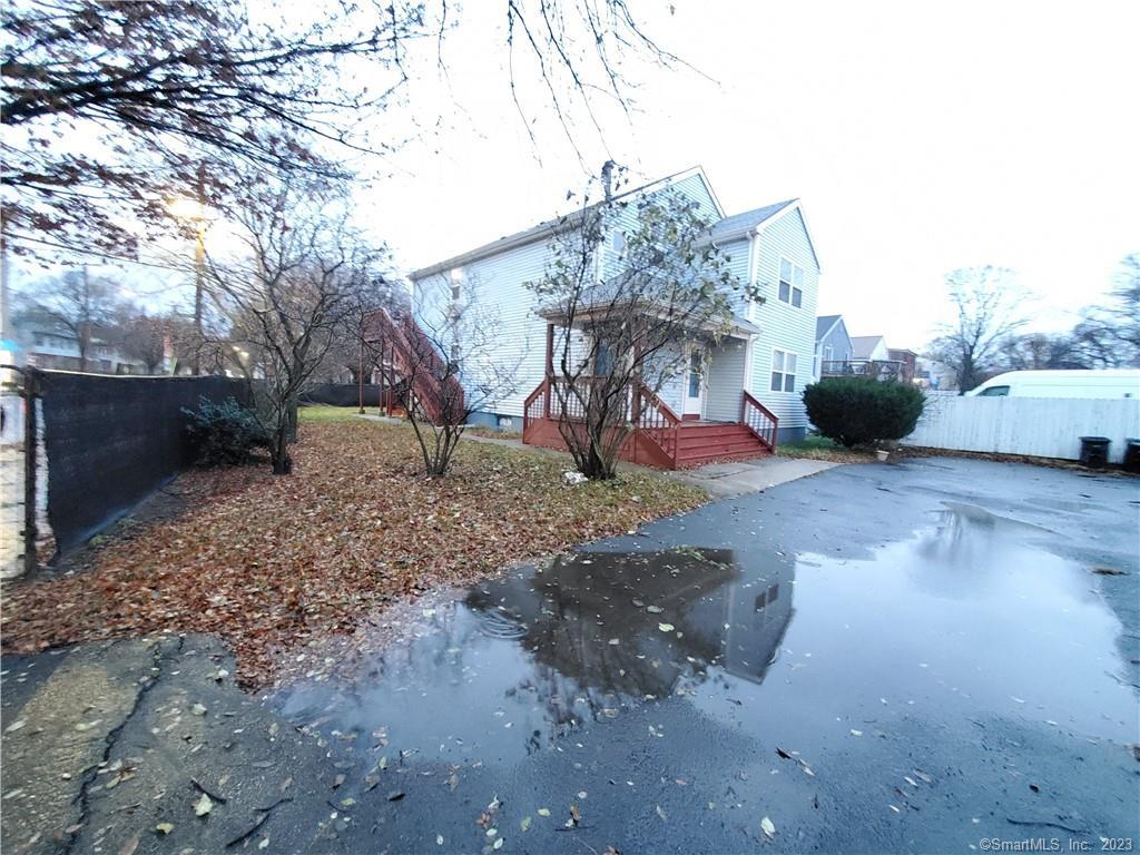 649 Congress Avenue, Unit 1 New Haven, CT 06519 - Photo 1 of 1 a view of a yard with a house