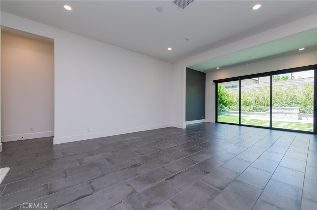 91 Rockinghorse Irvine, CA 92602 - Photo 18 of 48 a view of an empty room with a window