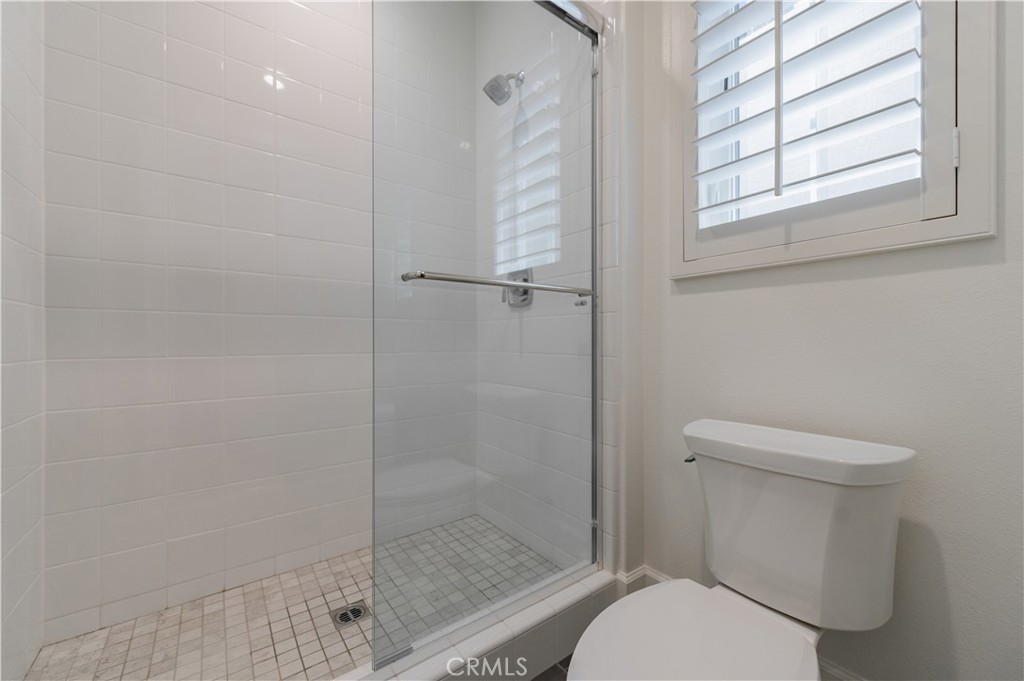 91 Rockinghorse Irvine, CA 92602 - Photo 23 of 48 a white toilet next to a window