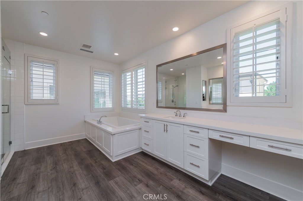 91 Rockinghorse Irvine, CA 92602 - Photo 35 of 48 a bathroom with a sink and a mirror