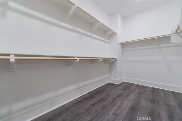 a view of an empty walk in closet