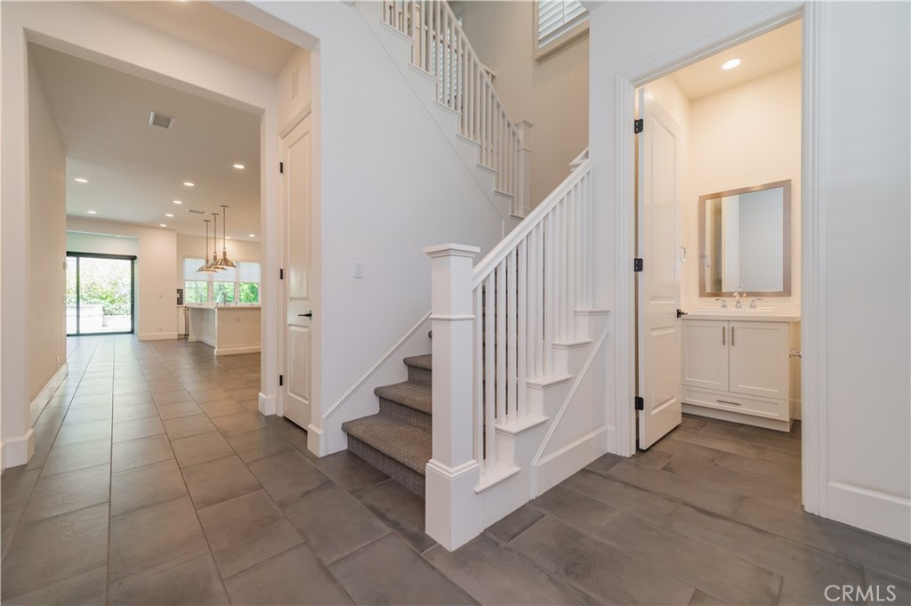 91 Rockinghorse Irvine, CA 92602 - Photo 4 of 48 a view of entryway and hall with a living room