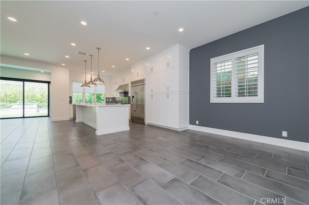 91 Rockinghorse Irvine, CA 92602 - Photo 6 of 48 a view of a kitchen with a sink and a window
